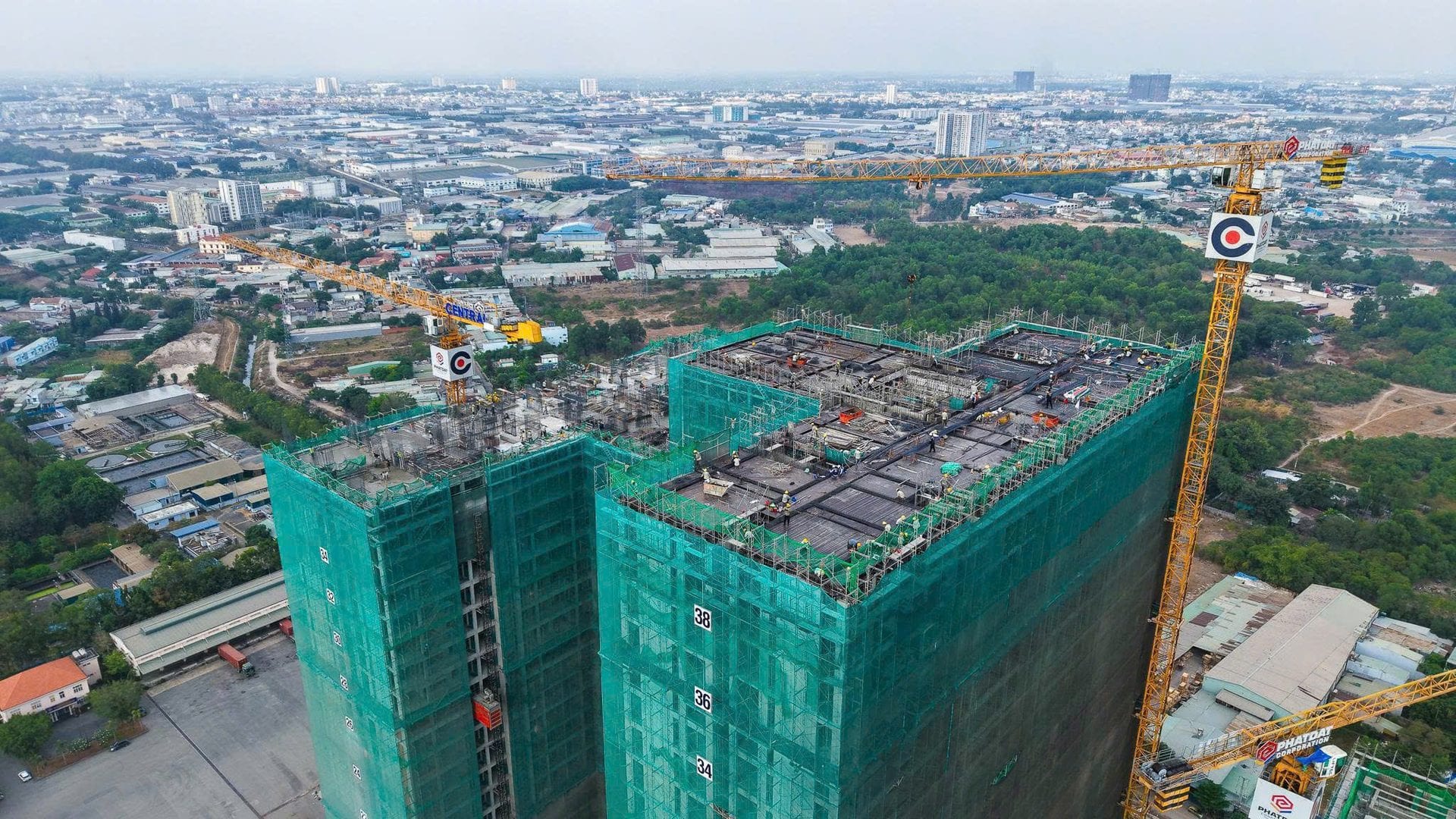 Twin tower tops with HCMC behind